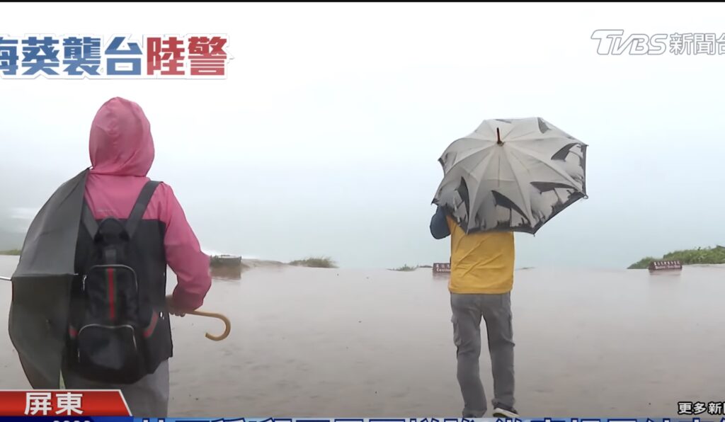 tourists in longpan park in kenting during typhoon haikui