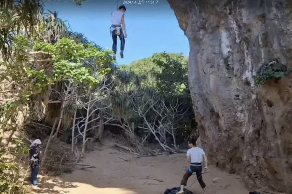 two men rock climbing in banana bay